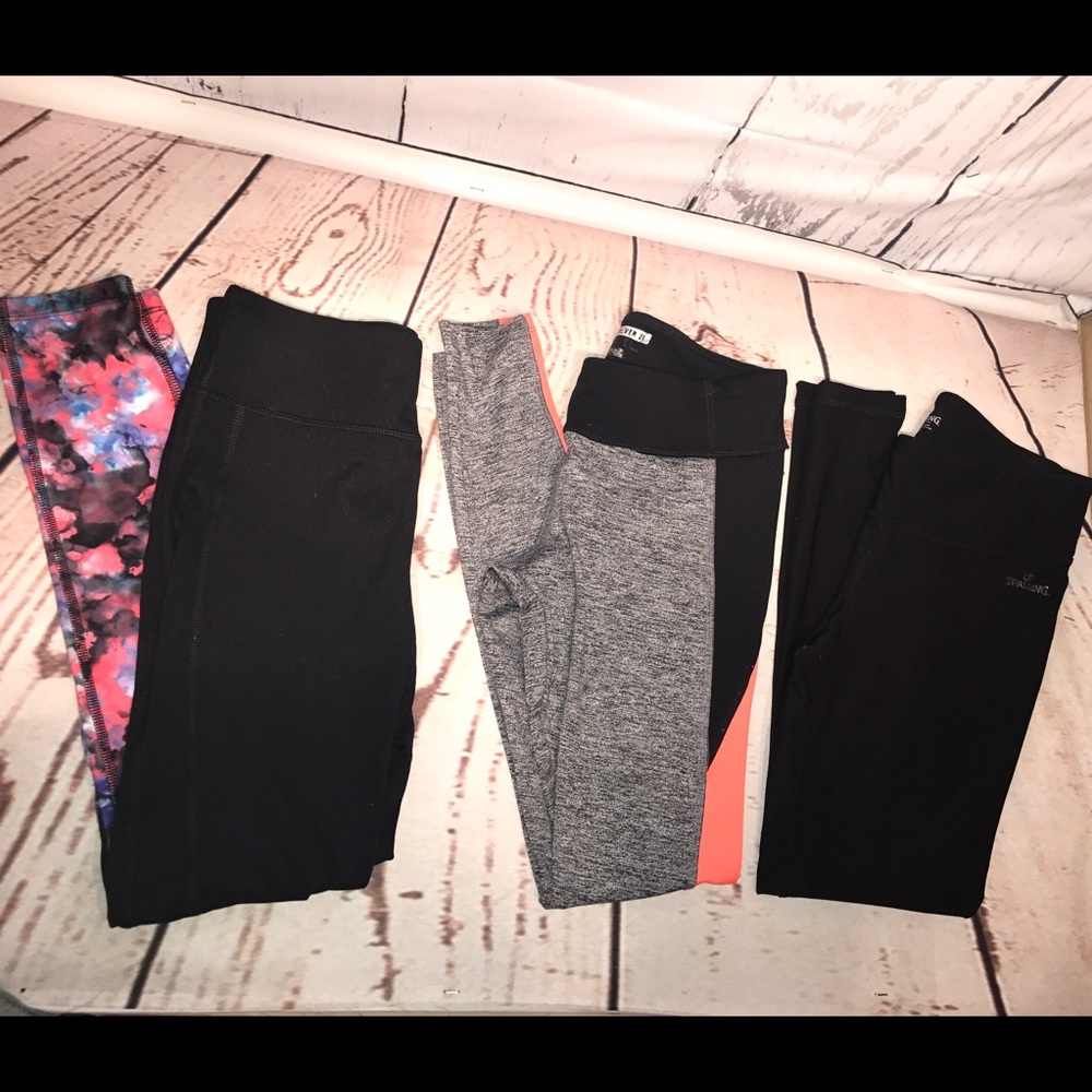 Three bundled women's athletic training leggings